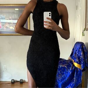 Black dress with a slit on the side good for going out to dinner